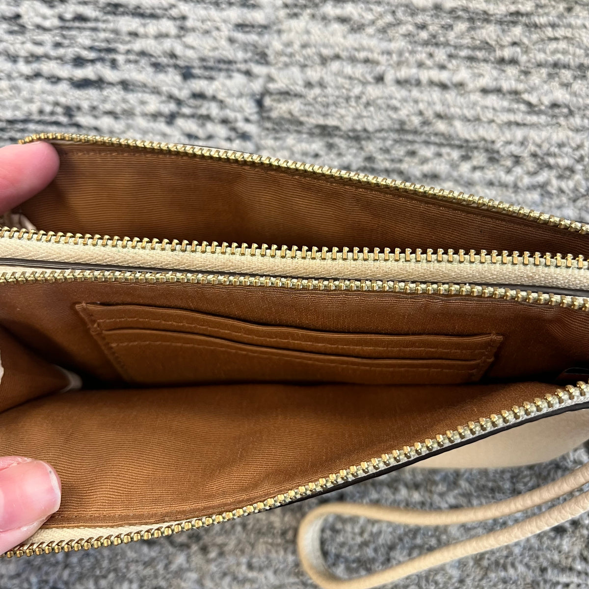 Cream Coach Wristlet