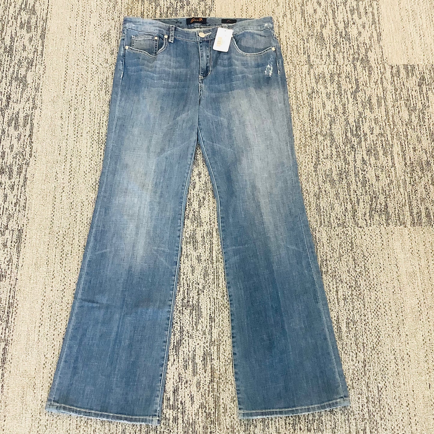 7 for all Mankind light wash flares size 12