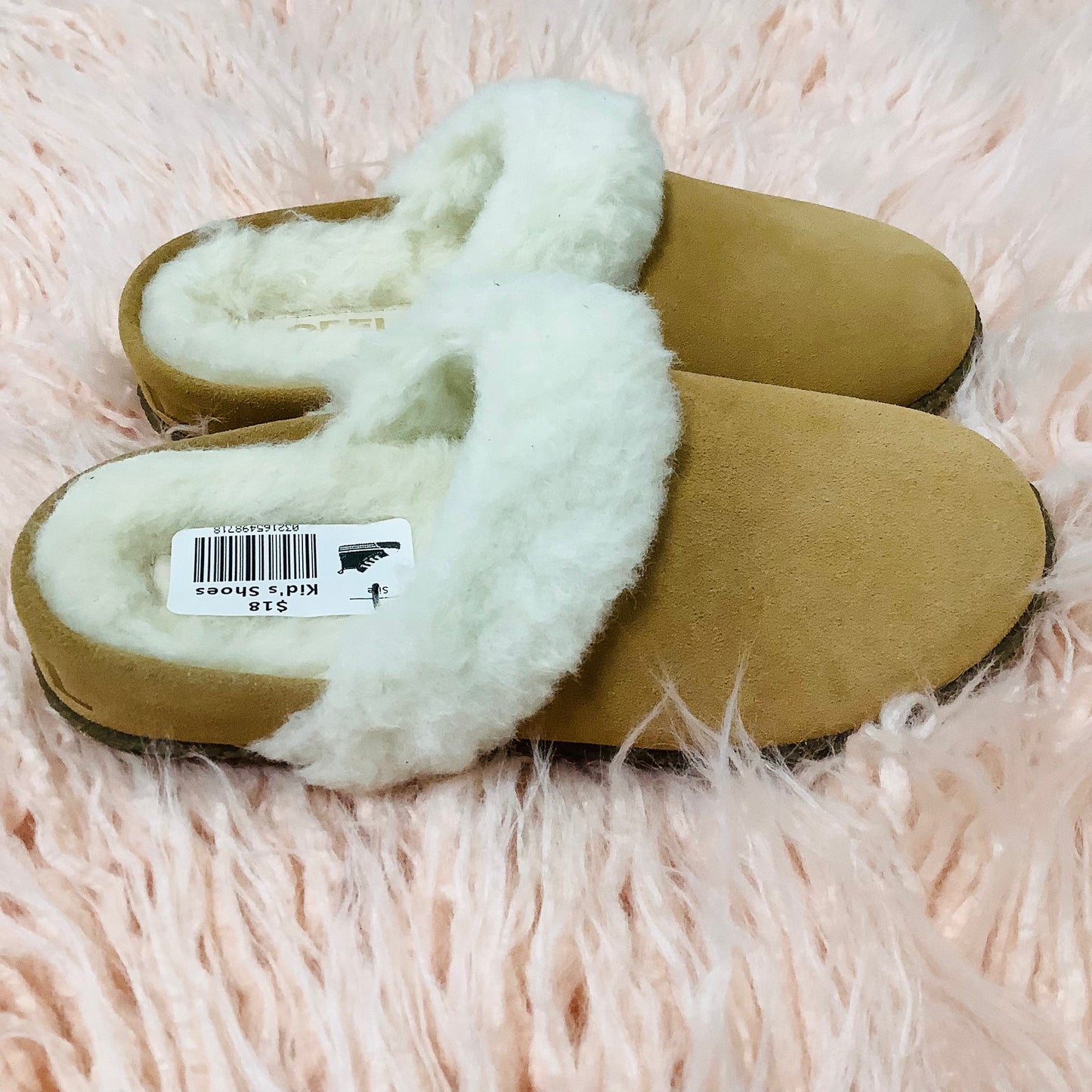 Kids SOREL size 1 leather slip ons