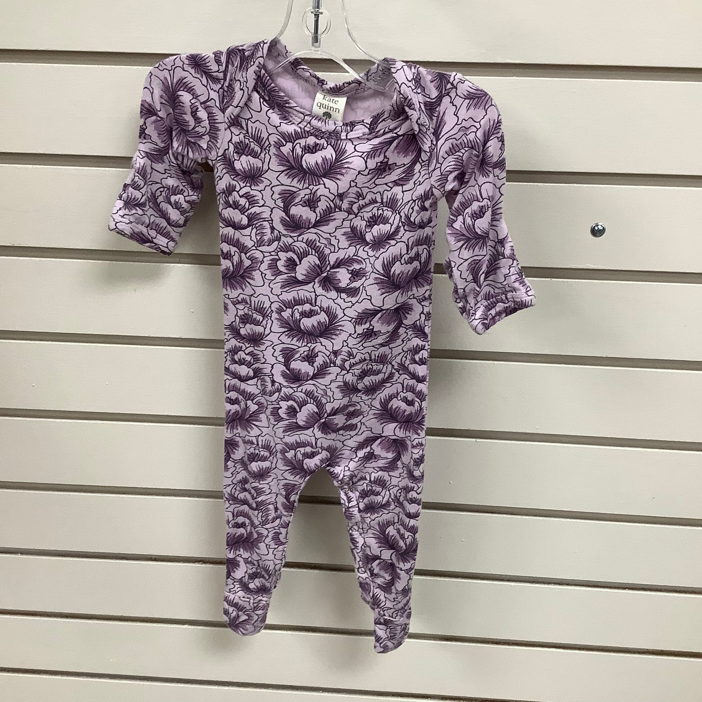 Kate Quinn purple newborn onesie
